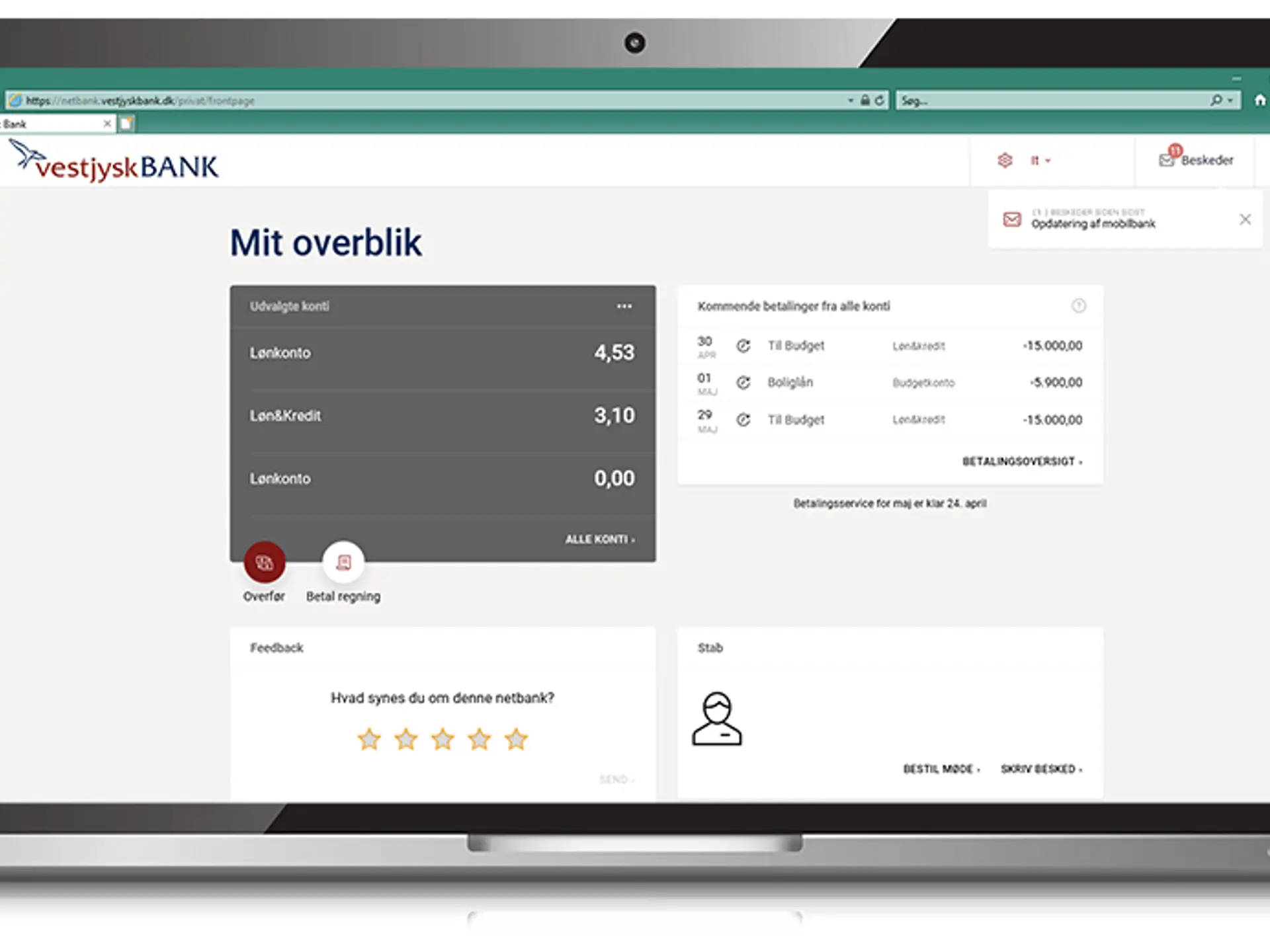 Vestjysk Banks netbank oversigt med Lønkonto, overførsler, budget og boliglån vises på en Macbook.
